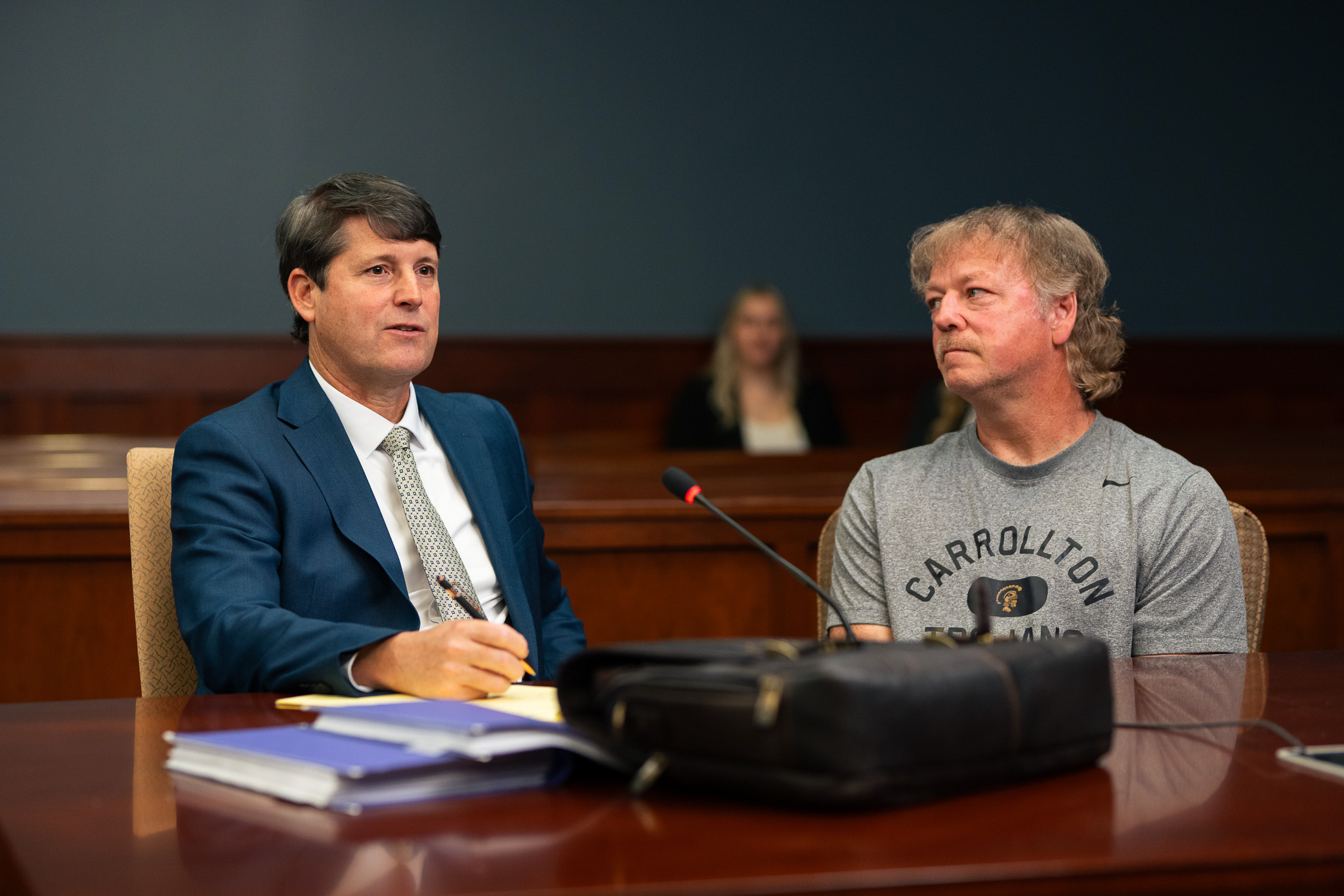 Attorney Met Lane meeting with a personal injury client in Carrollton