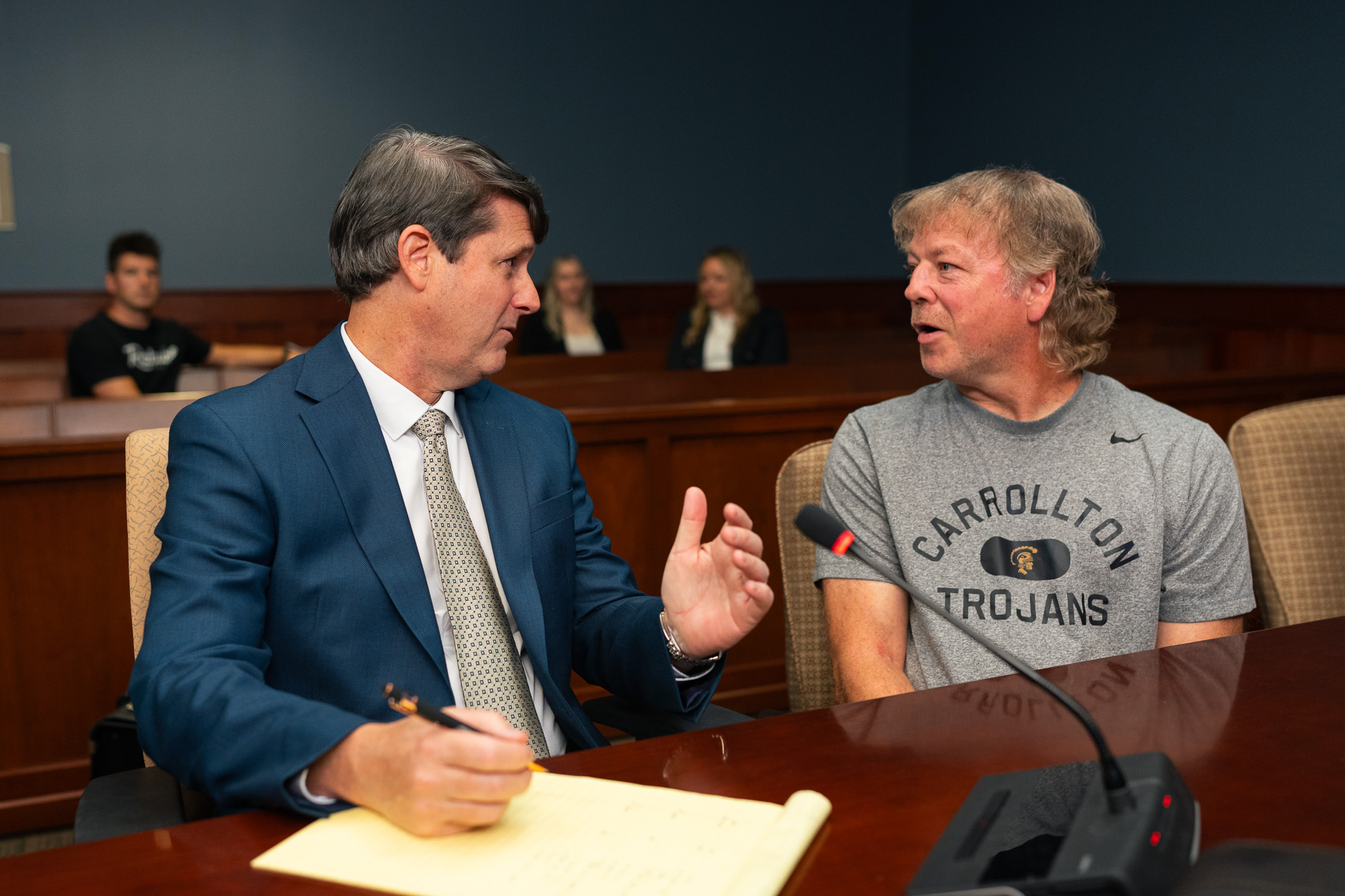 Attorney Met Lane consulting with a client about a Georgia divorce