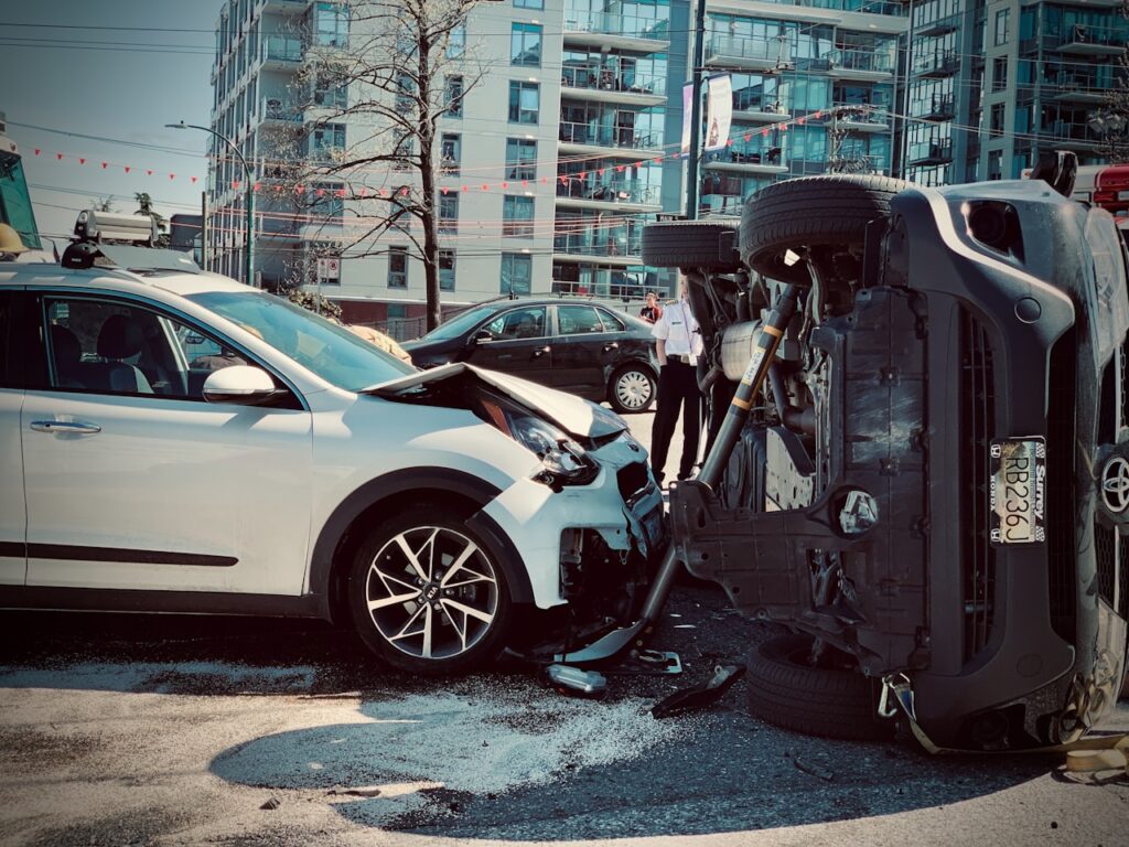 Two cars damaged after a collision, illustrating a Carrollton car accident
